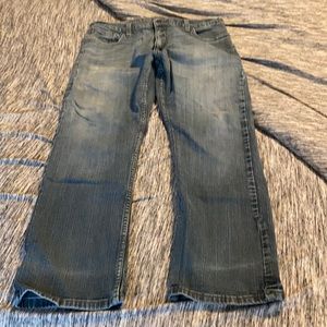 Men’s worn distresses Signature Levi’s.